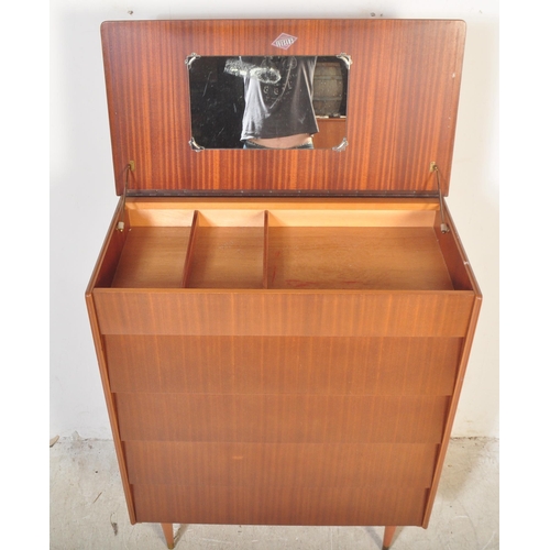 1306 - A retro mid 20th century circa. 1960's teak beehive chest of drawers / dressing chest having a lift ... 