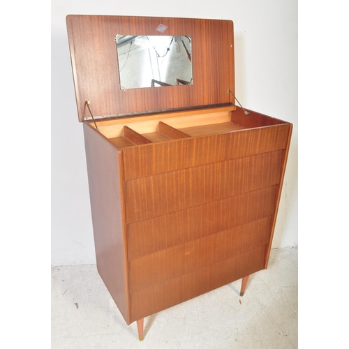 1306 - A retro mid 20th century circa. 1960's teak beehive chest of drawers / dressing chest having a lift ... 