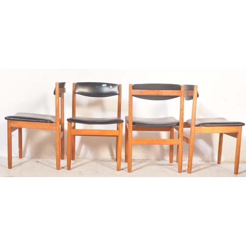 1307 - A set of four vintage retro mid 20th century circa. 1960's Danish influenced dining chairs having bl... 