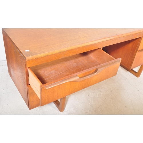 1312 - Avalon - A vintage retro mid 20th century circa. 1960's Avalon writing desk having a central kneehol... 