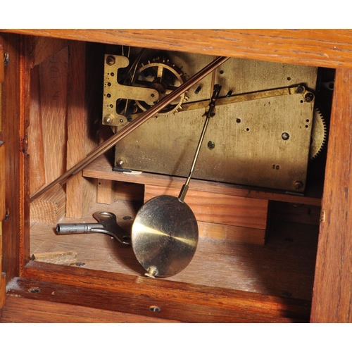 1317a - A retro 1950's mid 20th Century oak bookcase and clock combination. Of rectangular form with gallery... 