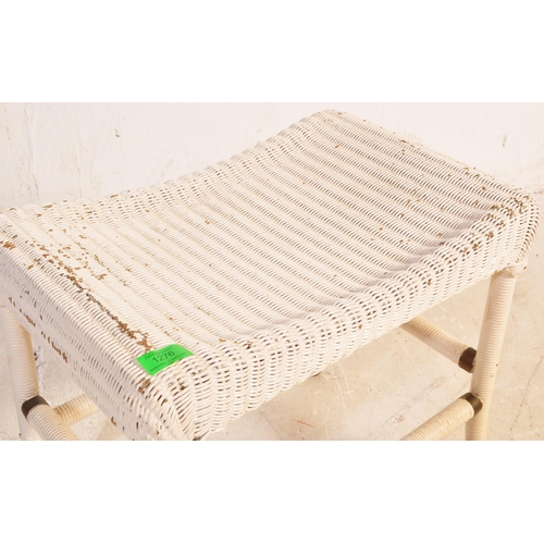 1320 - Lloyd Loom - A vintage retro mid 20th century circa. 1950's white Lloyd Loom stool having painted ca... 