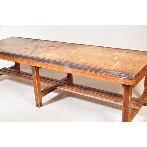 1324a - A large 20th century oak industrial style refectory dining table. The table having oak work top with... 