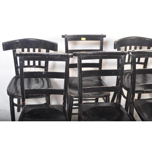 1324 - A collection of eight 20th century ebonised dining chairs. Each being painted in a black gloss with ... 