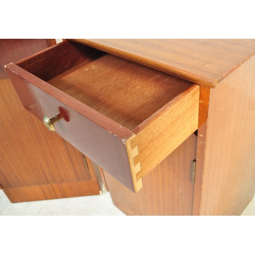 1330 - A pair of vintage mid 20th century walnut veneer bedside cabinets having a flared top over a single ... 