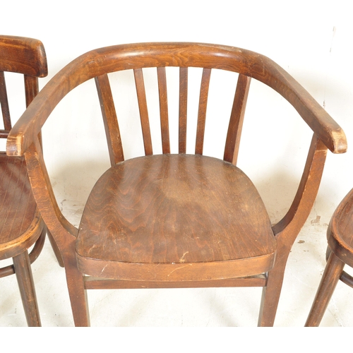 1331 - A collection of vintage 20th century bent wood dining chairs to include three standard chairs and a ... 