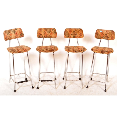 1338 - A set of four vintage retro mid 20th century circa. 1970's bar stools having back rest and seat upho... 