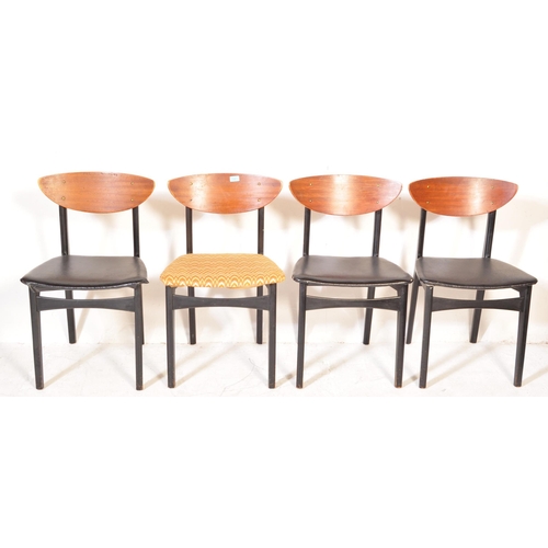 1340 - An assortment of four retro vintage 20th century teak & ebonised wood dining chairs. The lot to incl... 