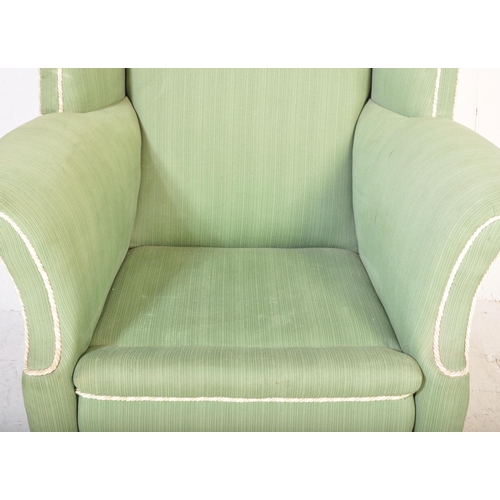 1347 - A retro vintage mid 20th century circa 1950s upholstered wingback armchair in pistachio green fabric... 