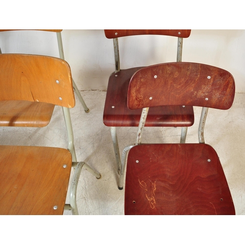 1354a - A collection of six vintage retro 20th century industrial style cafe dining chairs, each having pane... 