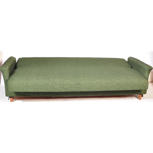 1363 - A retro vintage 20th century upholstered in dark green textured fabric four seater settee / sofa rai... 