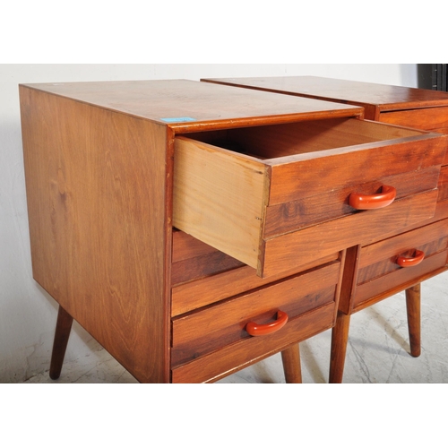 1370 - A pair of retro vintage mid 20th Century teak wood bedside cabinets / chest of drawers. Of rectangul... 