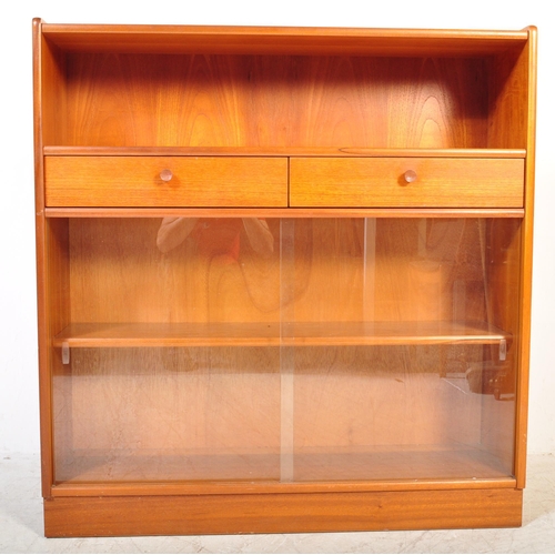 1393 - A vintage mid 20th Century teak bookcase unit. The bookcase having open recess to top above twin dra... 