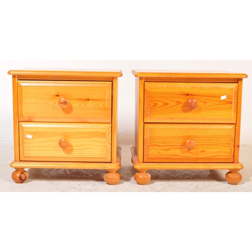 1396 - A pair of 20th Century pine bedside table cabinets. The cabinets having flared tops with a bank of t... 