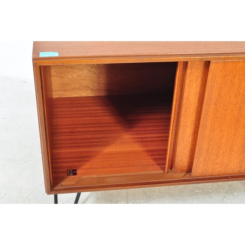 1397a - A pair of retro vintage mid 20th Century teak wood wall cabinets. Of rectangular form with twin slid... 