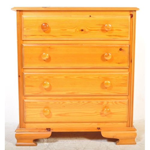 1397 - A 20th Century pine chest of drawers. The drawers having a flared top with four drawers, each with t... 