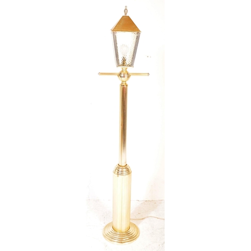 1399 - A vintage 20th Century light / lamp in the form of a lamp post. The light having a glazed lantern st... 