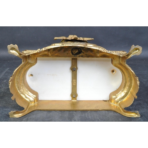 1401 - 20th century German Continental brass and marble mantel clock having a swirling finial, four rooster... 