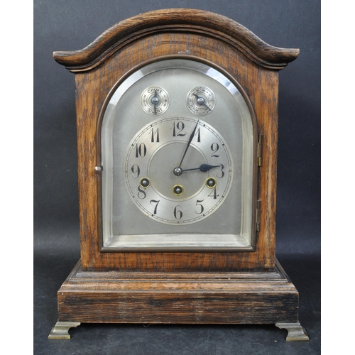 1404 - An early 20th  Century Oak Cased Mantel - bracket Clock. The clock with Westminster Chime movement b... 