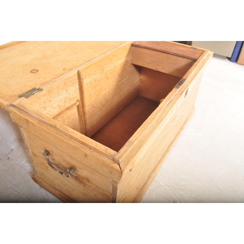 1407 - A 19th century late Victorian era pine wood blanket box having hinged lid opening to reveal candlest... 