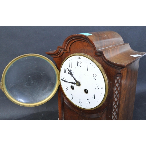 1410 - An Edwardian mahogany 8 day mantel clock by Japy Freres of Paris. Ball and claw feet with blind fret... 