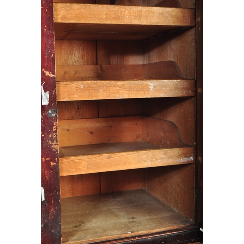 1413 - Large 19th century Victorian stained pine Church / vestry cupboard. Raised on plinth base with large... 