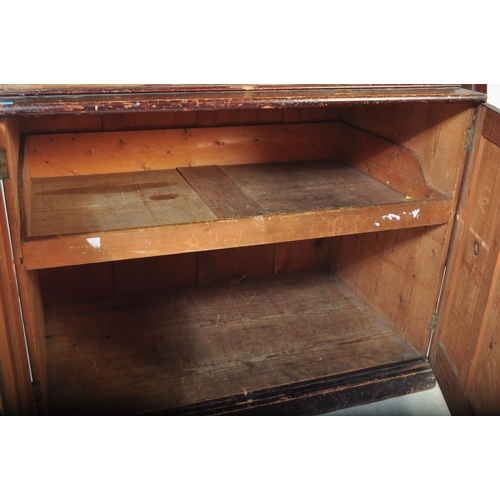 1413 - Large 19th century Victorian stained pine Church / vestry cupboard. Raised on plinth base with large... 