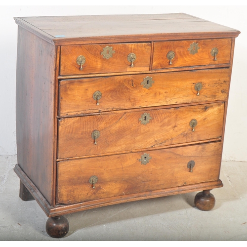 1416 - A 17th century walnut and elm William & Mary chest of drawers. Raised on bell feet with short and de... 