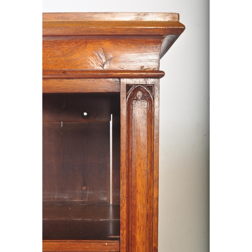 1419 - Large Victorian oak floor standing double bookcase. Carved detailing to the sides with reeded edges ... 