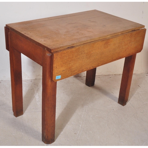 1421 - An early 20th century French provincial drop leaf solid dining table being raised on squared legs wi... 