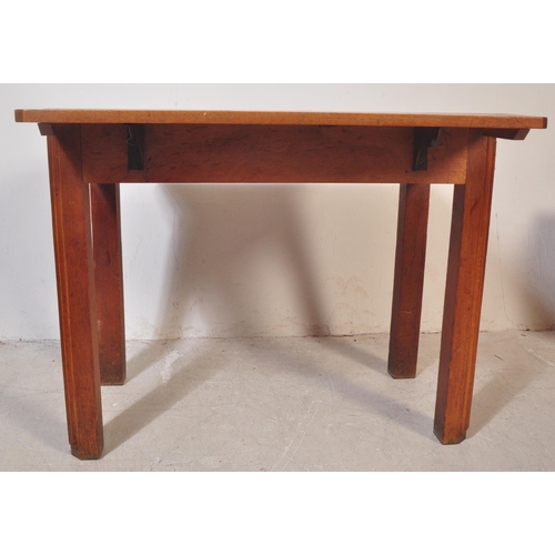 1421 - An early 20th century French provincial drop leaf solid dining table being raised on squared legs wi... 