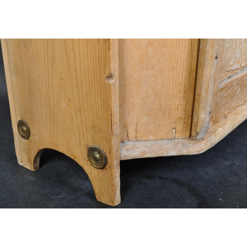 1426 - A Victorian 19th century pine hanging cabinet. Shelf over single twin door cupboard with shaped upri... 