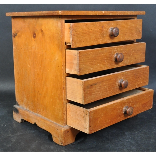 1428 - A Victorian 19th century country pine apprentice piece chest of drawers. Bracket feet with bank of 4... 