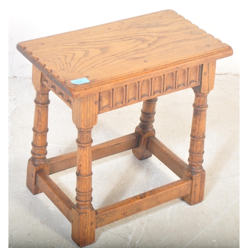 1429 - A 19th century Arts & Crafts oak peg jointed stool with turned column legs, squared off stretchers  ... 