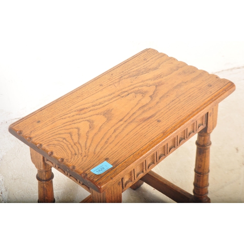 1429 - A 19th century Arts & Crafts oak peg jointed stool with turned column legs, squared off stretchers  ... 