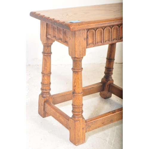 1429 - A 19th century Arts & Crafts oak peg jointed stool with turned column legs, squared off stretchers  ... 