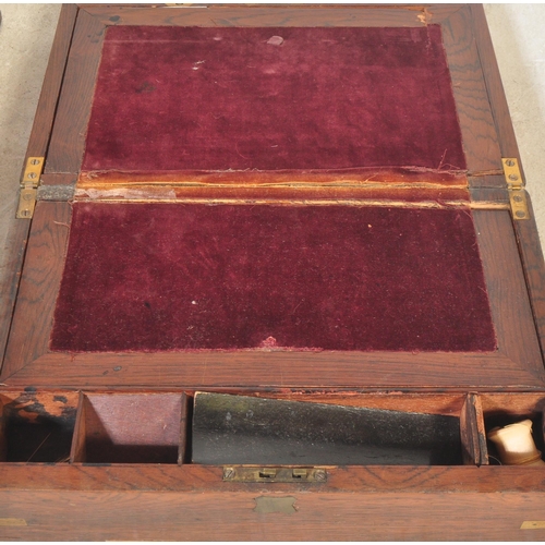 1443 - A large 19th century Victorian mahogany and brass bound writing slope desk box with fitted interior.... 