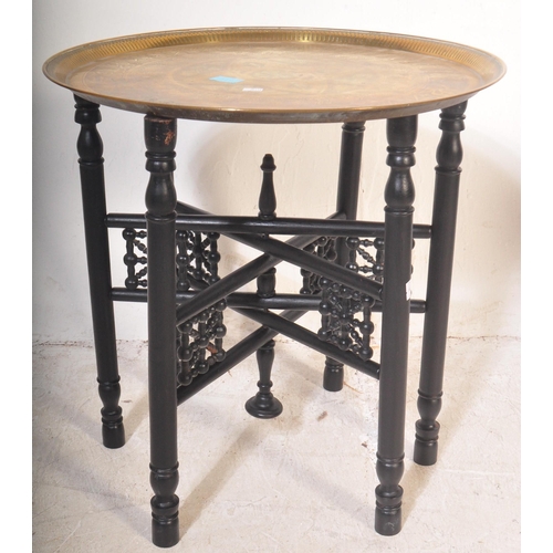 1449 - A vintage mid 20th century mahogany nest of graduating tables raised on cabriole legs with pad feet.... 