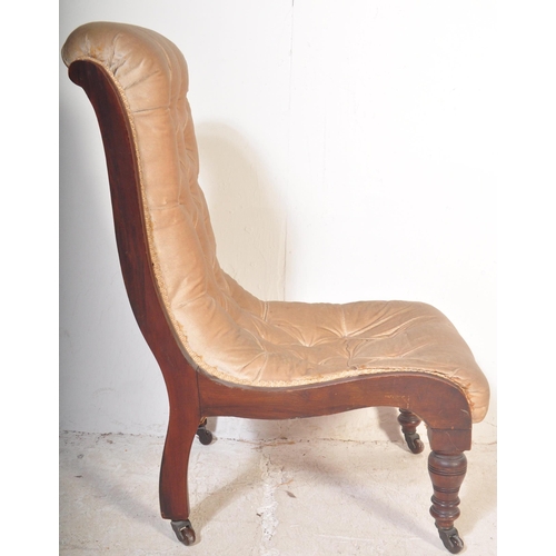 1454 - A Victorian 19th century Aesthetic movement nursing chair being raised on turned legs with castors h... 