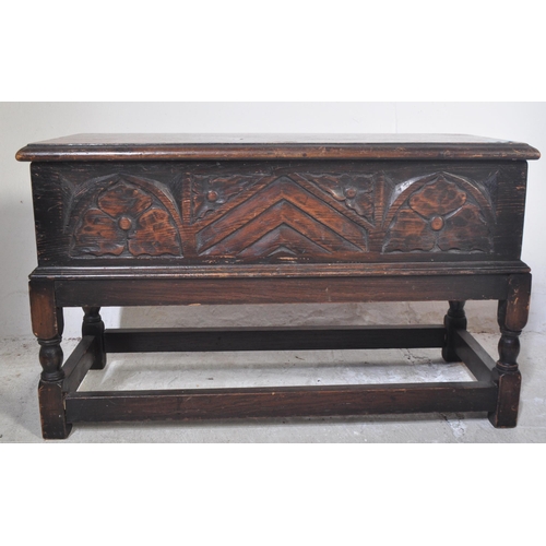 1461 - Jacobean revival carved oak bible box coffer on stand. Turned oak stand united by stretchers having ... 