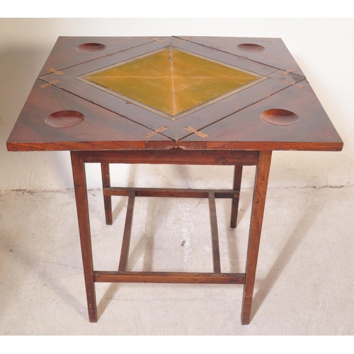 1462 - Manner of Edwards & Roberts. An Edwardian rosewood inlaid envelope card table. Of square form with f... 