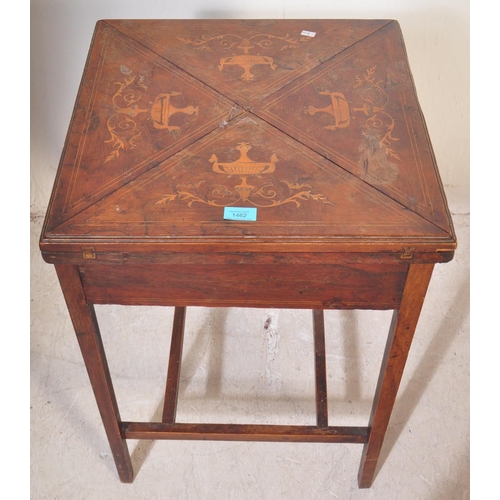 1462 - Manner of Edwards & Roberts. An Edwardian rosewood inlaid envelope card table. Of square form with f... 