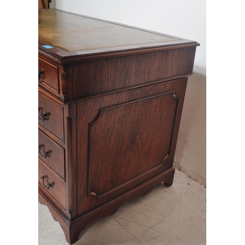 1463 - George III revival mahogany and leather twin pedestal office desk. Each pedestal with bank of drawer... 