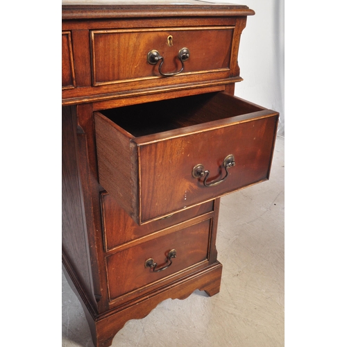 1463 - George III revival mahogany and leather twin pedestal office desk. Each pedestal with bank of drawer... 