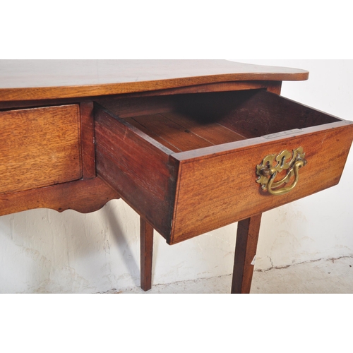 1465 - 19th Century George III mahogany serpentine top writing table desk. Raised on squared legs with fitt... 