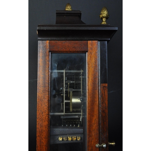 1478 - A late 20th century mahogany and glass cased Comitti of London Westminster chime wall mounted clock.... 