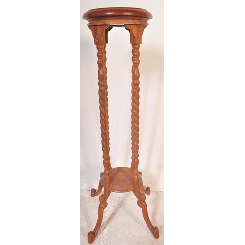 1479 - An Edwardian early 20th century inlaid side table having inlaid desecration to the top over turned b... 