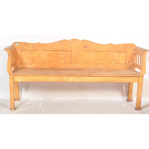 1494 - A 20th century large Scandinavian pine hall bench settle. The bench with hinged box seat compartment... 