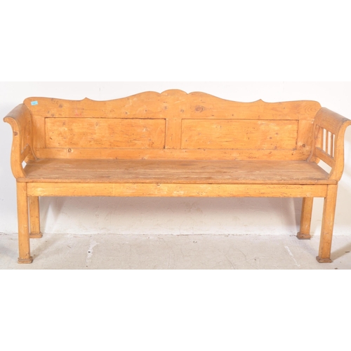 1494 - A 20th century large Scandinavian pine hall bench settle. The bench with hinged box seat compartment... 