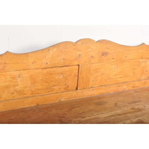 1494 - A 20th century large Scandinavian pine hall bench settle. The bench with hinged box seat compartment... 